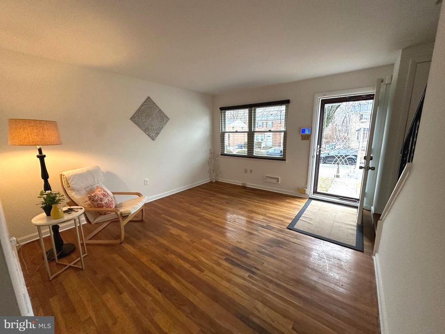 Welcome home to this freshly painted townhome that blends comfort, convenience, and easy living. Hardwood floors flow throughout, creating a warm and inviting feel from the moment you step inside. The main level offers a spacious kitchen and living area and a separate dining room—ideal for everyday meals or hosting friends. Upstairs, you’ll find two generously sized bedrooms, including a large primary bedroom with plenty of room to unwind, along with a full bath. The lower level features a convenient half bath and flexible space for storage or everyday living, and walkout stairs to the back yard. Enjoy the ease of parking just out back and take advantage of the community playground located right behind the home—perfect for enjoying time outdoors close to home. A great opportunity for low-maintenance living in a welcoming community—come check out this home.