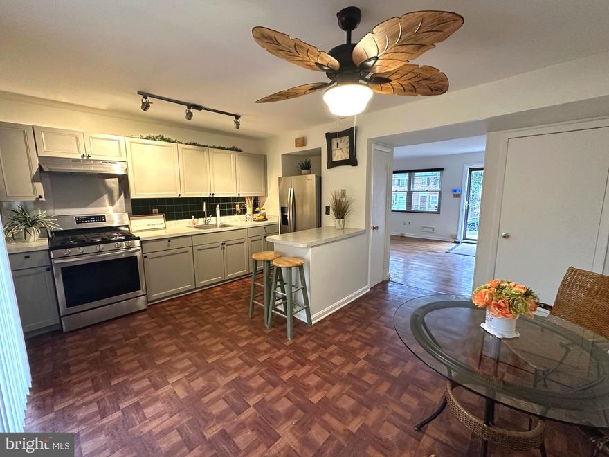 Welcome home to this freshly painted townhome that blends comfort, convenience, and easy living. Hardwood floors flow throughout, creating a warm and inviting feel from the moment you step inside. The main level offers a spacious kitchen and living area and a separate dining room—ideal for everyday meals or hosting friends. Upstairs, you’ll find two generously sized bedrooms, including a large primary bedroom with plenty of room to unwind, along with a full bath. The lower level features a convenient half bath and flexible space for storage or everyday living, and walkout stairs to the back yard. Enjoy the ease of parking just out back and take advantage of the community playground located right behind the home—perfect for enjoying time outdoors close to home. A great opportunity for low-maintenance living in a welcoming community—come check out this home.