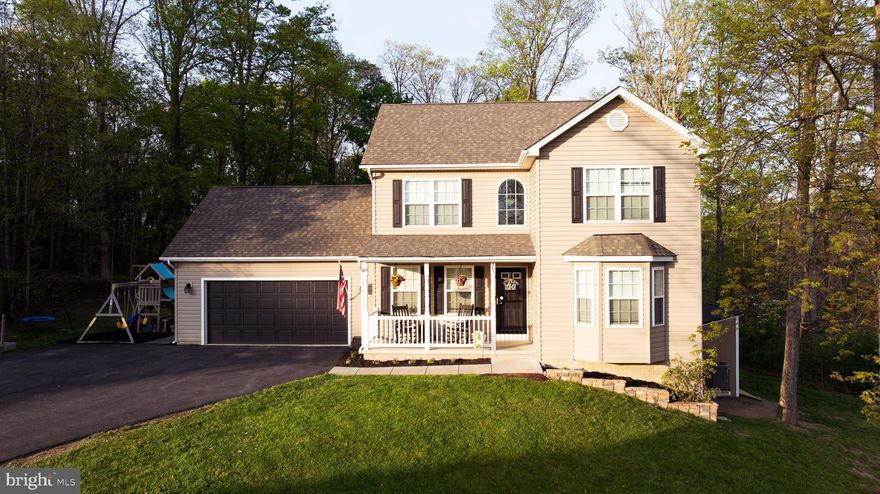 BACK TO ACTIVE! Nestled away in Inwood in the sought-after community of Cameron Acres is this CHARMING colonial sitting on almost half an acre! Sitting on one of the larger lots in the neighborhood and tucked away in a cul-de-sac, this home is a must see! This 4-bedroom 3.5 bath home has been well maintained and is move in ready. Off the foyer is a dining room large enough to fit an extended dining table. The foyer hallway leads to a spacious kitchen with enough room to eat in. The kitchen has a ton of counter space and a pantry.  The family room is large enough to entertain. The primary bedroom will wow you with a gorgeous bathroom and walk in closet and lots of space and natural light! Two secondary bedrooms and a full bath finish out the upstairs. The laundry room is conveniently located on the bedroom level. This home has an already finished basement with full bathroom and enough space to make it your own. The backyard backs to trees which adds tons of privacy. The large back deck is perfect for hosting guests or enjoying your morning coffee. The two car garage is over sized and can hold two cars. Come see for yourself this generously spaced and tastefully updated home in person! Easy access to Winchester or Charles Town and Martinsburg. This is the home you've been waiting for!