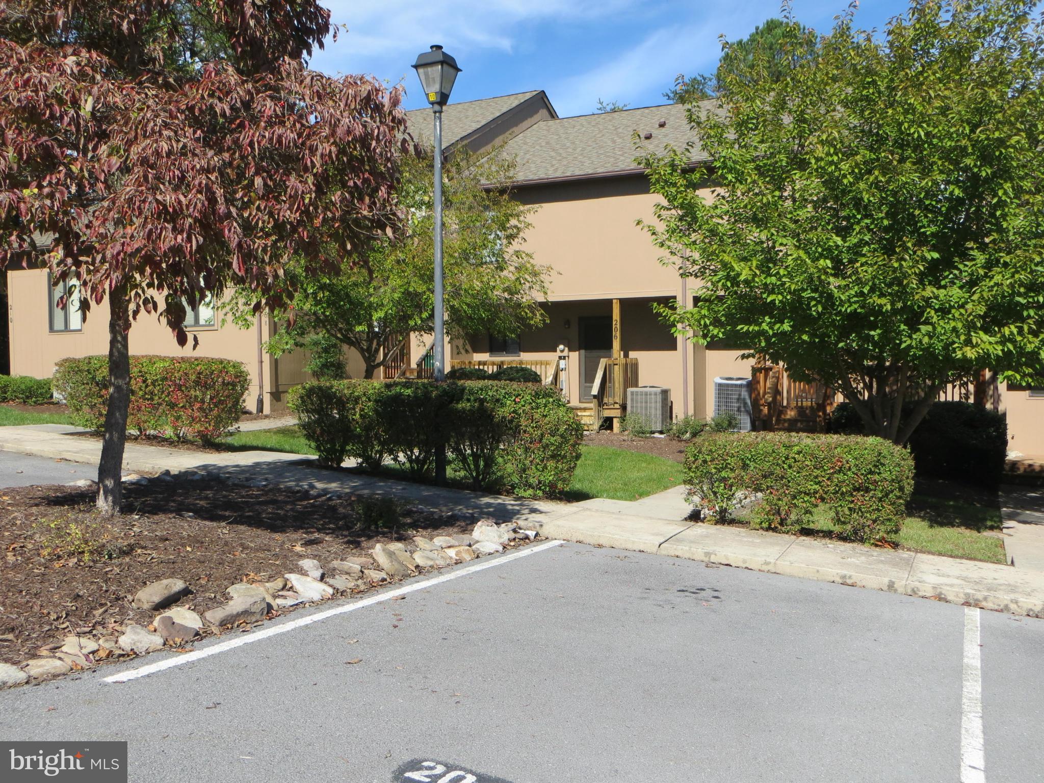Well maintained townhome located on the 12th Fairway of Stony Lick Golf Course. Town home features 2 BR & 2.5 BA. Dining/ living room has berber carpet, ceiling fan, wood burning fireplace. Master bedroom has sloped ceiling, large window overlooking golf course & walk in closet. Master bath has private toilet closet, shower & whirlpool tub. Full/golf membership with a $5350 initiation fee.