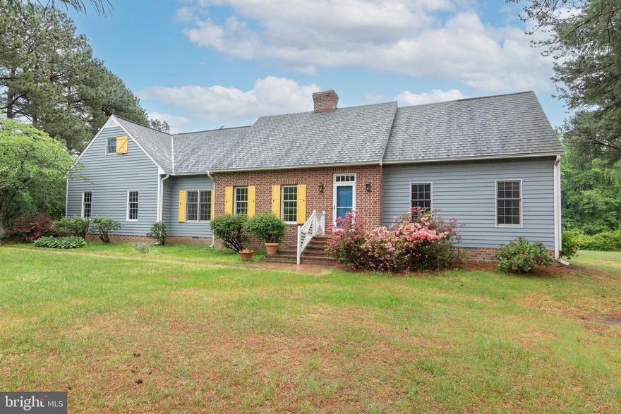 *Seller is having some painting done on the first floor and having the wall-paper removed this week.  
Excellent quality of construction is evident throughout this Charming Cape Cod in the extremely desirable  Earles Branch Subdivision . Notable features are yellow pine floors, solid pine floors, 9' ceilings on the first floor; wood burning fireplace with black walnut mantle; enormous screened porch, partial basement, first floor primary bedroom; asphalt driveway; and 2 huge unfinished attics on the second floor that provides plenty of storage or room to expand.  Convenient location close to Centreville and easy access to Route 301.