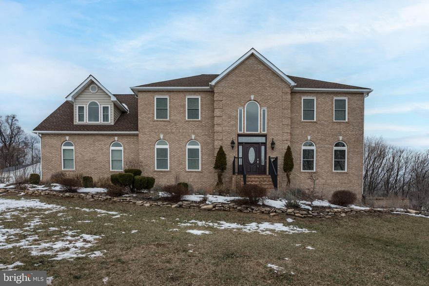 This stunning colonial on 2 acres awaits you. Sellers has done improvement in their 3 years. (please see in Doc's) Tabler Estates, is located between Martinsburg WV and Winchester Va. Only minutes away from I-81. This beautiful move in ready has 3 levels of finished living. Basement area can be changed into an in-law- suite. The main living area has a beautiful formal dining area, has hardwood flooring, Foyer hardwood flooring, Formal Livingroom hardwood flooring. Large combo Kitchen/Family room with gas fireplace.
Breakfast area, 3 car garage, Extra-large Owners Suite on upper level, Owner suite has laundry (washer & dryer) walk in closets, separate shower, tub, double sinks. Slate flooring, along with dressing area off of bath. adjoining sitting area owner's suite. 3 other bedrooms upper level, with full bath. Basement is fully finished, walk out basement. Landscaped with fruit trees (fig, pear, apple & cherry. flowering shrubs,)Veggie beds. Shed in rear of property.  Sellers Nonsmoker's not pets during their time.