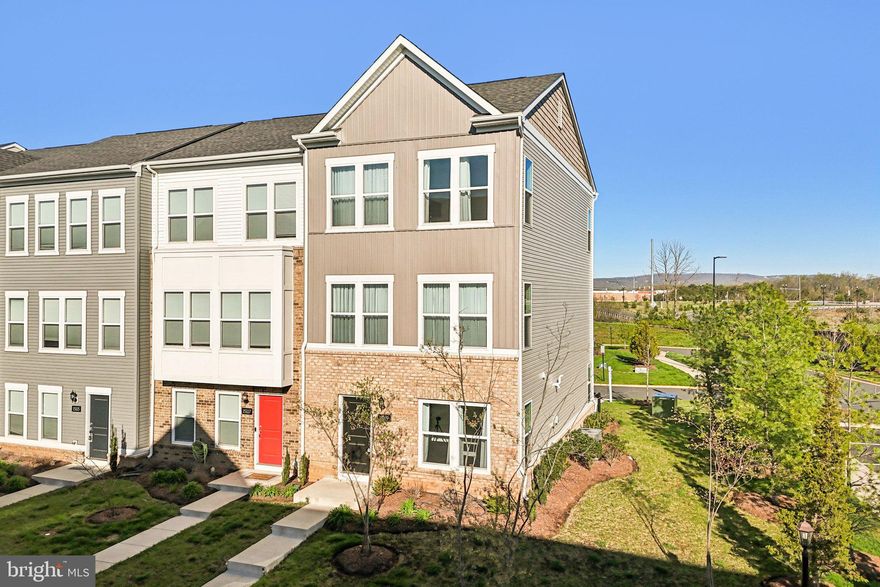 Welcome to 15119 Jaxton Square Lane, a beautiful MOVE-IN READY end-unit townhome located in the desirable Crossroads Village community in Haymarket. Built in 2023, this 4-bedroom, 3.5-bath home offers approximately 1,980 square feet of modern living space along with a 2-car garage with EV CHARGER and the added privacy and natural light that comes with an end unit. The open-concept main level features wide-plank flooring and seamlessly connects the living, dining, and kitchen areas, highlighted by a stunning kitchen with white cabinetry, quartz countertops, stainless steel appliances, and a large center island ideal for entertaining. Upstairs, the spacious primary suite offers a bright and comfortable retreat with a well-appointed en-suite bath, while additional bedrooms provide flexibility for guests, a home office, or growing families. This home is ideally situated just minutes from I-66, offering easy access for commuters, and is conveniently located near Haymarket Medical Center, Virginia Gateway shopping and dining, and charming downtown Haymarket. With walkable restaurants, nearby parks, and a low-maintenance lifestyle in a prime location, this home offers the perfect blend of comfort, convenience, and modern design.