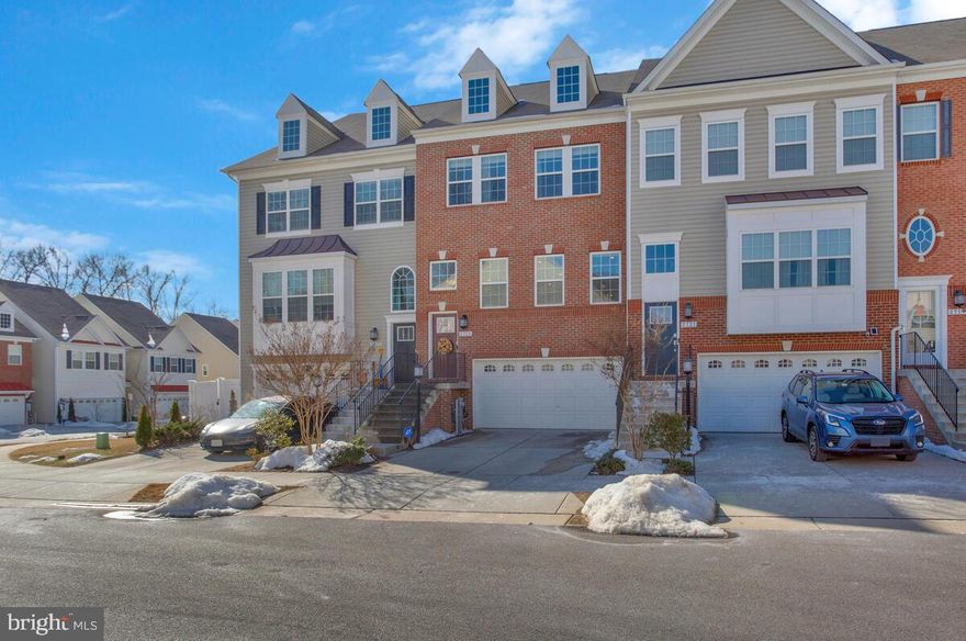 Welcome to this beautifully maintained home in Summerfield Village, just off of Waugh Chapel Rd in Gambrills. This property boasts a gourmet kitchen with quartz countertops and backsplash, upgraded cabinets, custom lighting, and stainless-steel appliances. The kitchen also has a large, walk-in pantry and butler's station. Another fantastic, sought-after feature in this home is the 4th level with roof-top deck, perfect for relaxing or entertaining. This level also features a family room with half bath. The primary suite on the third floor is expansive with large windows, a ceiling fan and good-sized walk-in closet. The attached primary bathroom features a dual-sink vanity with quartz countertops and spacious shower. With a front-entry, two-car garage, the lower level gives you extra family room space in the back with a walk-out to the concrete patio. The second level also features a walk-out from the kitchen to another deck so there is plenty of outdoor space to enjoy. Enjoy the convenience of nearby shopping and dining while being just a stone's through away from major commuter routes like Rts 3, 97 and 32. Only five years old, this home truly offers it all - space, location, and modern amenities.