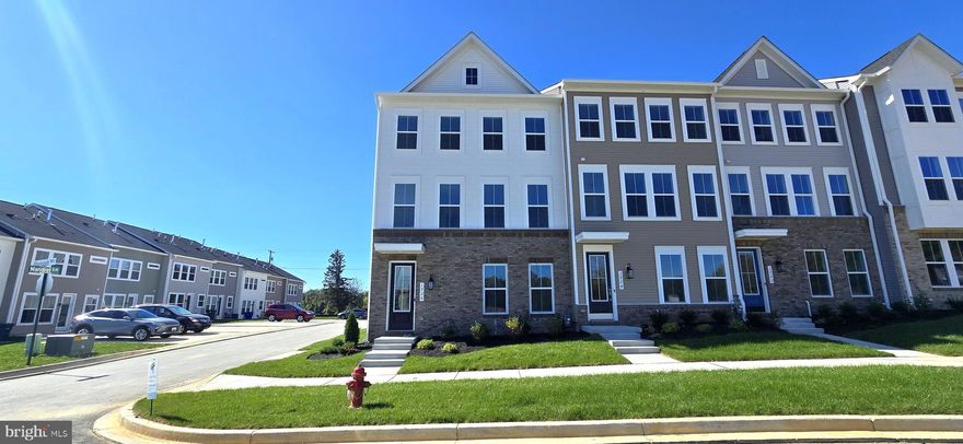 Beautiful Brand-New End Unit Townhome in The Towns at Gambrill Glenn – Frederick, MD

Welcome to this stunning newly constructed end-unit townhouse located in the desirable Towns at Gambrill Glenn community in Frederick, Maryland. Offering approximately 2,400 square feet of modern living space, this home features 4 bedrooms and 3.5 bathrooms, designed for comfort and contemporary living.

The main level includes a private bedroom suite with a full bath—perfect for guests or extended family. The gourmet kitchen is a showstopper, featuring a large center island, abundant cabinetry, quartz countertops, a stylish ceramic backsplash, and premium stainless steel appliances. The open-concept layout flows seamlessly into the dining and living areas, enhanced by low-maintenance luxury vinyl plank flooring and elegant oak stairs leading to the upper level.

Upstairs, the primary suite offers a luxurious bathroom with quartz countertops, upgraded ceramic tile flooring, and a frameless glass shower enclosure. The upper level also includes additional bedrooms, a full bath, and a convenient laundry area.

Residents of Gambrill Glenn enjoy a convenient lifestyle close to shopping, dining, and entertainment options. The community includes picnic areas and jogging/walking paths and offers easy access to major commuter routes, including I-70, I-270, and Route 15.

This home perfectly blends modern design, comfort, and convenience—ready for you to make it your own!