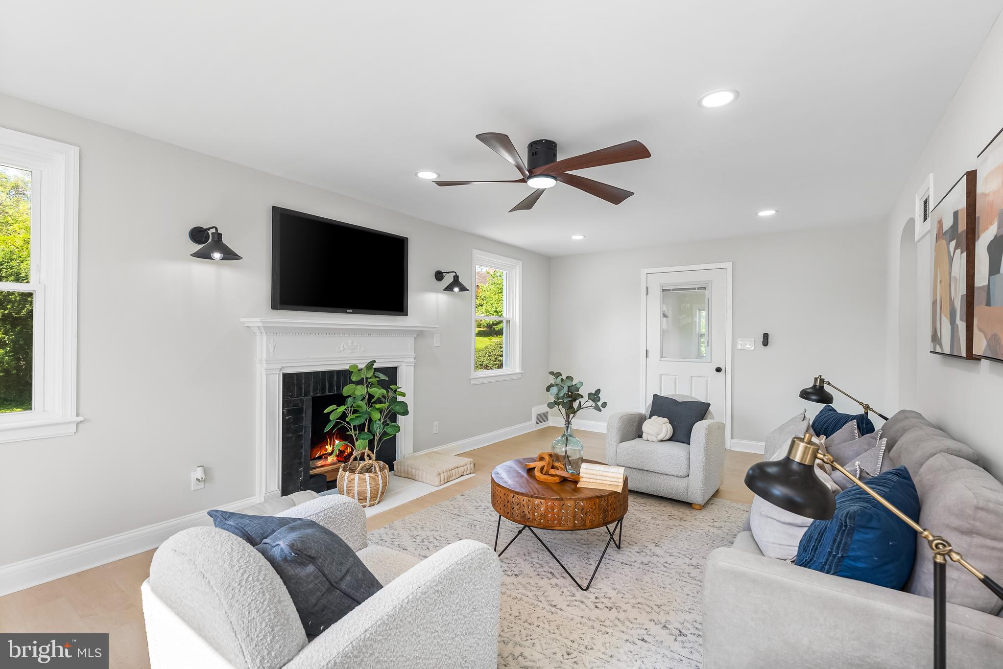 Welcome to 3500 The Alameda! This stunning brick single family home in Ednor Gardens features 3 bedrooms and 2.5 bathrooms. Upon entering, you're greeted with recessed lighting, new LVP flooring and fresh paint. The bright and inviting living room showcases a cozy fireplace and natural light pouring through the large windows and flows seamlessly into the newly renovated modern kitchen with top-tier features like quartz counters, tile backsplash, a peninsula breakfast bar, and new stainless-steel appliances, the kitchen is open to the spacious dining area. On the main level, adjacent to the living room is a bonus area perfect for a home office or mudroom, and offers a private entrance, ceiling fan and windows providing tons of natural light. Upstairs, discover 3 bedrooms. The upstairs full bathroom offers modern and luxurious finishes, new tub and tile surround, and an upgraded double vanity. The fully finished lower level is perfect for a family room, guest space or home gym and also offers an additional fully updated full bathroom. New windows, new roof and new HVAC, this home is ready for new owners! Conveniently located near restaurants, shops, Lake Montebello, John Hopkins, and a quick drive to Baltimore Inner Harbor. Commuter routes to I-83, I-395 and I-95. Outside offers driveway parking and a detached garage.