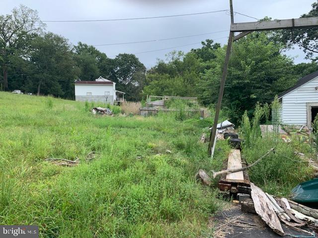 Building lot for sale ! 1.82 located at 61 Walnut Grove Road, Elkton, MD. Structures, clean up to be completed by new owner. A recent perc test indicates a sand mound septic will likely be required. MDE has no approvals in place. Please confirm details with the Cecil County Health Dept./ MDE
