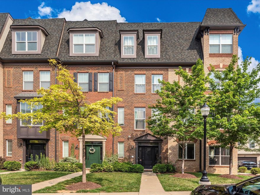 Stunning, freshly painted, 4 level Wormald home with all of the bells and whistles! First impressions are important, and the front entry does not disappoint. As you walk inside, you're welcomed by a multi use space, which could be used as your formal sitting area for entertaining, a luxe office space, or casual hang out. The space is adorned with custom painted doors and custom lighting. You have ample closet space, a powder room, and access to your oversized 1 car garage. The oak stairway is bright with natural light and brings you to the second level which offers an even more of a city chic vibe with a well appointed, no expense spared kitchen, exposed brick wall, high ceilings, recessed lights, fireplace for cozy evenings in, and a deck for your enjoyment. The kitchen boats upgraded stainless steel appliances, granite countertops, built in wine fridge, double gas oven, and an island for informal dining. The oak stairwell to the 3rd level boasts even more drama with two story ceilings and bright natural light. The 3rd level is where you'll find two generously sized bedrooms, each with their own large closet, your laundry room and a full bath. This luxe home truly saves the best for last, the oak stairwell bringing you to the 4th level primary penthouse suite, featuring a spacious outdoor "Coffee Deck" for private rooftop entertaining, a large primary bedroom, closet built-ins, and a spa bathroom drenched in natural light. The spa bathroom offers a large soaking tub, separate shower with a frameless door, dual sinks, and upgraded tiling throughout. Monocacy Park is a small, upscale neighborhood surrounded by mature trees while being just steps away from endless shopping and dining options, or a short drive to experience all that downtown Frederick has to offer, as well as easy access to useful commuter routes such as 15, 70, & 270, and nearby Marc Station.