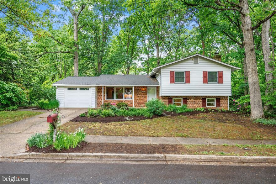 Welcome to 1402 Catlyn Place in the desirable Heritage community! This spacious 4-bedroom, 2.5-bath, 3-level split offers a fantastic location close to shopping, parks, libraries, community amenities, and major commuting routes. The home features a large eat-in kitchen with abundant cabinetry, separate pantry, display shelving, and a built-in desk area. The dining room is enhanced by a dramatic floor-to-ceiling mirror that adds light and an open feel to the space.

The cozy family room showcases a brick accent wall, full-length raised hearth, and wood-burning fireplace — perfect for relaxing evenings at home. Additional highlights include a large storage/laundry room with outside access, a one-car garage, raised flower beds, and a walkway leading to the fenced rear yard.

Enjoy beautiful year-round wooded views from the slider and oversized picture window. The private backyard is filled with mature trees, perennial gardens, flowering shrubs, and abundant wildlife, creating a peaceful natural setting. Residents also enjoy access to the community pool.

Being sold “As-Is” and priced to sell quickly — this is a wonderful opportunity to make this home your own!
Check out the visual tour link.