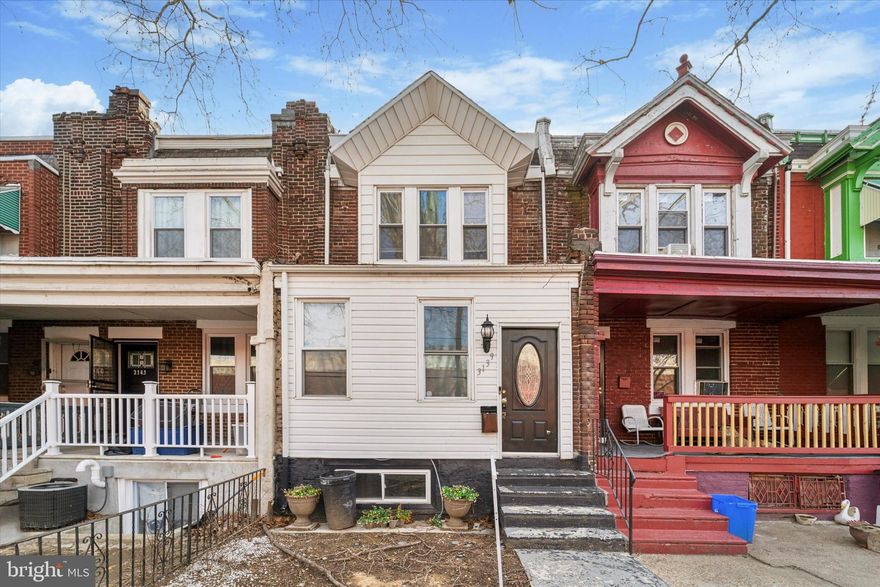 SEE VIDEO VIRTUAL TOUR. Welcome Home to the beautifully updated 3139 N 26th St in Philadelphia! Enter into the sunny, fully enclosed porch with tile flooring.  This is the perfect foyer space to store your shoes, coats, bags, etc., and to sit and sip your morning coffee in the sun.  From there, enter into the main floor, gorgeously updated throughout, including wood floors in the living and dining rooms,  chair rails, crown molding, recessed lighting and coffered ceilings. The kitchen is equipped with every updated appliance, including a cook top electric range, built-in microwave, side-by-side refrigerator, dishwasher, and gooseneck faucet with detachable sprayer, ALL stainless steel.  The granite counters and sleek tiled backsplash ties everything together, giving it that polished look!  On the second floor, there are 3 spacious bedrooms and a full bathroom, all with lovely updated finishes, doors, windows and tastefully painted with accent walls. In the basement, you will find the washer and dryer as well as another half bath! To top it all off, this home also offers a private backyard patio, perfect for a night under the stars! Words truly do not describe how beautifully this home shows, so schedule your tour today to see it all for yourself and make this YOUR home!