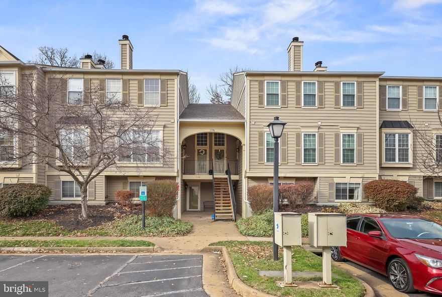 Desirable Ground Level unit with 2 Beds and 2 Full Baths. As you enter you will be greeted by the open, inviting floor plan, with fresh paint throughout. Features large family room with cozy fireplace and picturesque windows that allow for an abundance of natural light. Spacious kitchen adjacent to eat-in dining area, and leads to the private rear patio with view of tree lined common area. This unit boasts two spacious bedrooms; including the Primary suite with walk-in closet and newly refinished Primary bathroom. Additional updates include new washer/dryer, updated dishwasher, crown molding detail, new window coverings and  more. Great location with wonderful community amenities: Basketball and Tennis Courts,  Tot Lots/ Playgrounds, Swimming Pool, Walking Trails and Picnic Area. Location is everything!  Nearby to many restaurants, shopping, hospitals and historic Manassas. Easy commuter access- just a few minutes to I-66 and Rt 28. Don't miss this one!