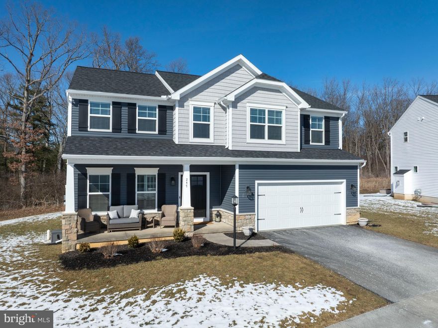 OPEN HOUSE - Sunday, March 1st, 12:00 - 1:30 PM.  Built in 2025, this 4-bedroom, 2.5-bath home is truly move-in ready, showcasing clean, crisp finishes and tasteful upgrades throughout. Large windows fill the living spaces with natural light, enhancing the home’s bright and inviting feel. Situated on one of the best lots in the neighborhood, the property backs to a private tree line, offering added beauty and privacy.

Designed with both function and style in mind, the open-concept main level is perfect for everyday living and effortless entertaining with more than $100,000 in options and upgrades in this home. The location is equally impressive — just minutes from Beaver Stadium and the shopping and dining along North Atherton Street.

Enjoy low-maintenance living with a low-fee HOA that includes snow removal and lawn care. Most furniture is available for purchase, making this a true turnkey opportunity.  Includes: office desk, matching file cabinet and rug, four counter chairs, two bar height chairs, two black shelving units in pantry, all TV mounts, curtains and blinds.  Additional furniture available for purchase.