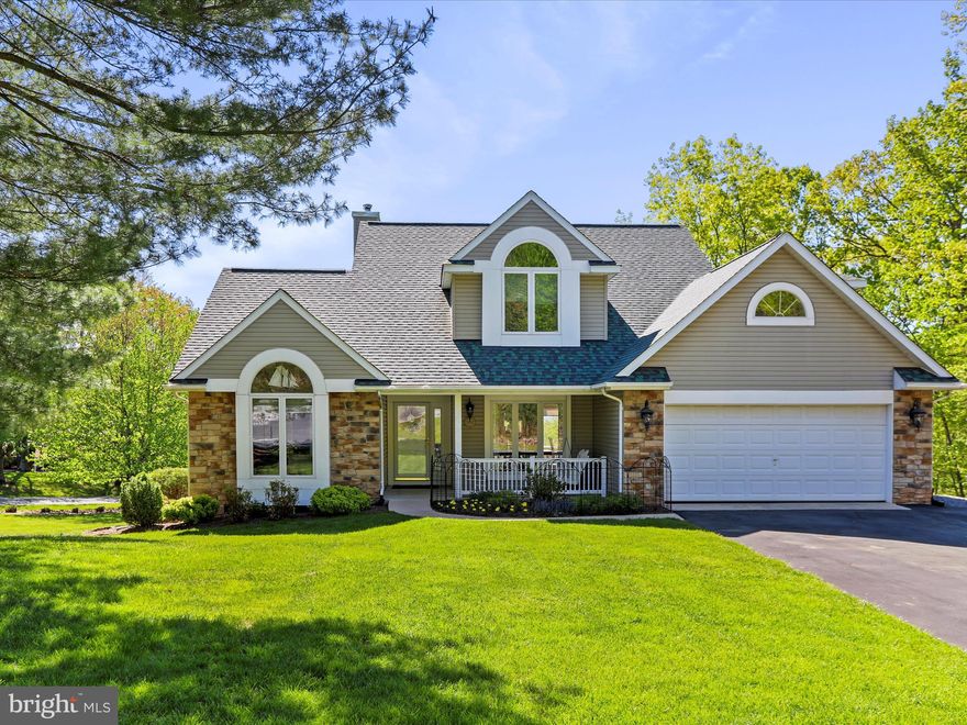 Welcome to one of the most immaculate homes in The Woods-inside and out. From the manicured grounds bursting into spring to the inviting front porch swing calling you to
"sit a spell," this home delivers the perfect blend of timeless charm and thoughtful upgrades.
Step through the welcoming foyer and take in the rich Brazilian KOA hardwood floors-imported and unforgettable-flowing seamlessly throughout the main level. Just to the right, the formal dining room invites natural light through near floor-to-ceiling windows, while rounded wall corners throughout the home add a touch of elegance (and a buffer against life's little bumps).
To the left, the private primary suite is a tranquil haven featuring vaulted ceilings, low-pile carpet, and a soothing, light-filled atmosphere. The spa-like en suite bathroom offers heated ceramic tile flooring, a spacious walk-in shower with a glass block window for natural light and privacy, and a pocket door for added separation. Beyond the bath, you'll find a massive walk-in closet complete with custom built-ins-designed for both storage and serenity. Dual sinks, a large vanity, and a stylish mirror complete this luxurious retreat.
The great room is a showstopper-vaulted ceilings, a stunning fireplace with wood-burning stove insert and stone surround, remote-controlled window shades on the tiered windows, and a built-in Bose sound system to set the perfect mood. From here, step directly into the main-level screened-in porch-an ideal spot for morning coffee, evening breezes, or relaxing in the shade while overlooking the beautifully landscaped backyard.
The eat-in kitchen offers gorgeous backyard views, granite countertops, custom cabinetry, pendant and recessed lighting, and not one, but two pantries. The adjacent laundry room is more than functional-it's stylishly finished with granite counters, a deep sink, and plenty of storage. The oversized two-car garage is insulated, finished, and ready for your workshop or hobby space.
Upstairs, you'll find three beautifully appointed guest bedrooms, each with soaring vaulted ceilings that create a sense of light and openness. Two of the bedrooms feature spacious double closets and plush, low-pile carpet-ideal for comfort and easy upkeep.
The third guest bedroom, located above the garage, feels like its own private retreat with a generous walk-in closet, recessed lighting, and a cozy alcove perfect for reading or quiet reflection. Whether hosting friends, grandkids, or extended family, the upper level  
offers stylish, serene accommodations for all. A full guest bath with ceramic tile flooring and a solid-surface vanity completes the level.
The finished lower level is the cherry on top: engineered hardwood flooring, a full bath with ceramic tile floors and shower surround, a large family room with plantation Shutters, recessed lighting, and a recessed media alcove with built-in storage. Anchoring the far end of this versatile space is a bold, beautiful board and batten accent wall-bringing elevated character to your potential game room, in-law suite, or private hideaway. A sliding glass door opens to a fully fenced container garden area, perfect for growing herbs, flowers, or just enjoying a bit of backyard serenity. And just off the family room, a second screened-in porch-separately accessed-offers another quiet, shaded escape for relaxing outdoors in total comfort.
Outside, enjoy easy access from the laundry room to the backyard via a short set of steps leading to the beautifully maintained lawn. The home features dual-zone HVAC (two heat pumps) and a stunning 24' x 14' two-story Amish-built shed-fully wired and ready for serious storage or your next creative project.
This home also includes a Class A membership to The Woods Club, granting access to championship golf, indoor and outdoor swimming, tennis, fitness center, clubhouse, hiking trails, and more-with a one-time membership initiation fee required upon activation.