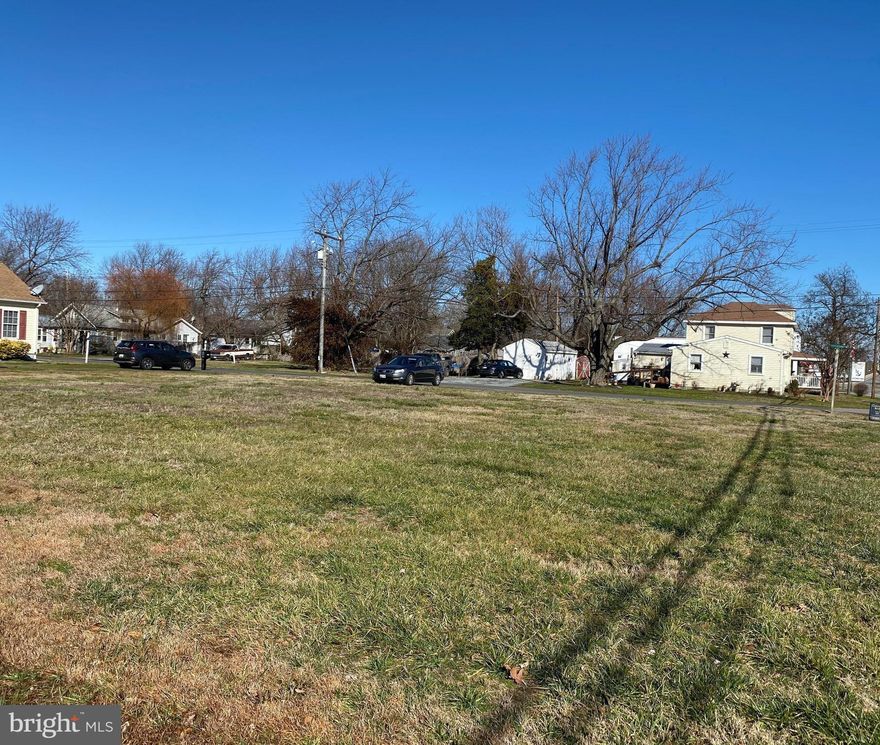 Residential corner lot with commercial or combined use possibilities.