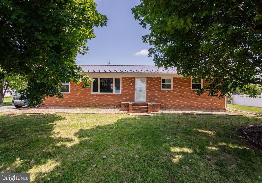 Charming brick ranch featuring 3 bedrooms, 1.5 baths, and 1352 sq ft of finished living space. Enjoy new LVP flooring throughout, a metal roof (2020), and a large, partially fenced backyard! The unfinished basement offers endless potential. Conveniently located within a short distance to the park. Don't miss out!