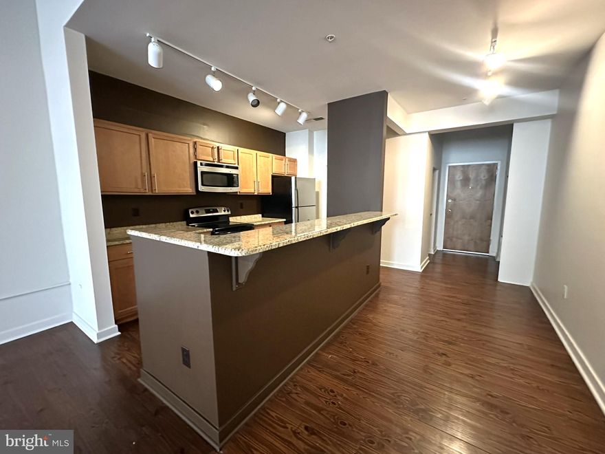 Welcome to 1510 Chestnut Street! A 30-Unit high-rise building located steps away from City Hall. This location boasts easy access to some of Philadelphia's greatest restaurants, shops, and bars. You will love having endless entertainment directly outside your front door and public transportation makes commuting throughout the rest of the city a breeze!

Take one step into the apartment and be immersed in open concept living at its finest. There is an open concept floor plan between the living room and kitchen which is perfect for when you're entertaining guests or hosting holidays. There is hardwood flooring and exposed ductwork which adds the perfect pop of character to the space!

The kitchen is luxurious and includes everything you need to prepare the perfect meal. It has been renovated with light oak cabinetry, granite countertops, and stainless steel appliances. It comes fully equipped with a refrigerator, four-burner electric range, built-in microwave, and dishwasher. There is also a breakfast bar countertop which is perfect for barstool seating!

Both bedrooms are similar in size and can accommodate a king-sized bed and complete bedroom set with ease. The primary bedroom includes an en-suite bathroom for added convenience and two closets for storage and organization. The second bedroom includes a large walk-in closet and tall windows which allow tons of natural light to pour!

Off the kitchen is the second bathroom complete with a modern vanity, full-sized bathtub, stackable washer and dryer and built-in shelving! In addition to all the great features throughout the apartment, the building also includes a secure intercom system and fitness center at no additional charge!

Tenant is responsible for electric, gas, water, and cable/internet in addition to rent each month. Sorry, no pets permitted.

Application Qualifications: Minimum monthly income is 3 times the tenant’s portion of the monthly rent, acceptable rental history, acceptable credit history and acceptable criminal history. More specific information provided with the application.