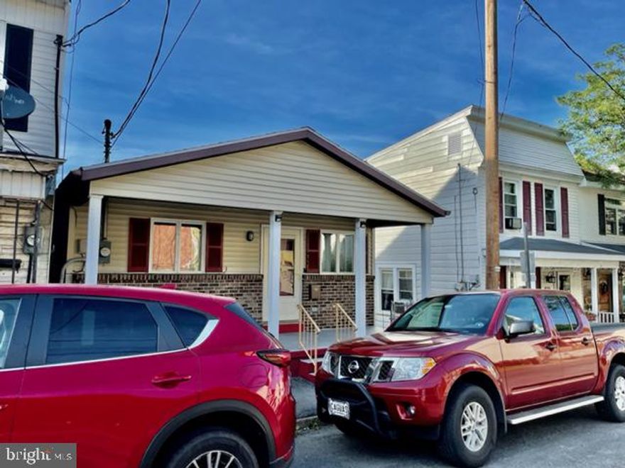 Such a beautiful home. All electric. Lower level finished (heat needed). Walk out basement. Fenced in back yard. 2 beautiful decks. Roof 3 years old. Off street parking for 2 vehicles . Take a look. Relaxing deck viewing the rear yard. Off street parking. Window A/C included. Range, refrigerator , washer , dryer ,snowblower and lawnmower included