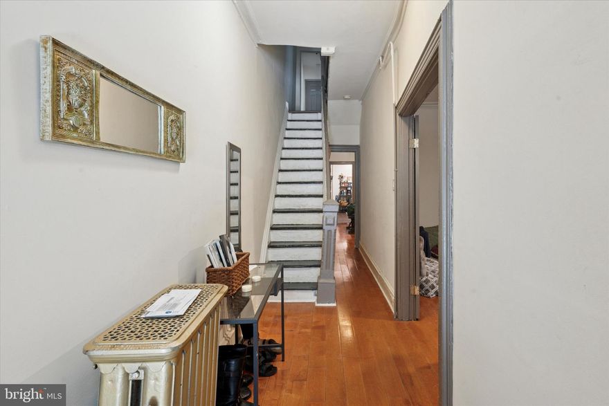 Welcome to this beautifully maintained single-family home in the heart of Powelton Village, a rare find in one of Philadelphia’s most desirable neighborhoods.

This spacious residence offers over 6 bedrooms and 2.5 baths, blending timeless character with thoughtful updates. Enjoy soaring ceilings, original moldings, stained glass, and abundant natural light throughout. The inviting front patio, private backyard, and elevated deck create the perfect outdoor escapes.

Inside, the first floor opens to a generous living room filled with historic charm, followed by a formal dining area ideal for gatherings. A recently updated kitchen anchors the space, flowing seamlessly into a convenient powder room, laundry area, and direct access to the backyard.

Upstairs, the second and third floors feature well-proportioned bedrooms with ample closet space, complemented by two full bathrooms. The expansive basement provides plenty of storage or the potential for future customization.

This home is perfectly suited for a growing family, professionals seeking historic charm with modern comforts, or investors alike. Currently rented for $4,000 per month with the potential for more, and with a strong rental history, it presents both a lifestyle opportunity and a sound investment.

Located within walking distance to UPenn, Drexel, and nearby hospitals, as well as SEPTA and Amtrak transit, the property also sits near new schools, coffee shops, restaurants, and parks. The combination of convenience, character, and community makes this home truly special.

this Home is priced to sell. Don’t miss your chance to own this gem in Powelton Village, schedule your private tour today!