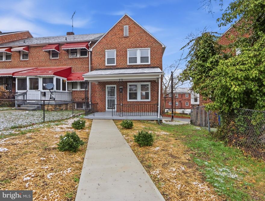 Fully permitted renovation of end of group row home with rare off street parking for three cars.  The one you've been waiting for.  A fenced front yard and newly constructed winding sidewalk lead to the inviting front porch entrance.  Inside, enjoy a bright open concept design featuring a gourmet kitchen with 41" white cabinetry, striking quartz countertops, stainless steel appliances, pantry storage, and an oversized island perfect for entertaining.  The kitchen provides easy access to a maintenance fee rear deck, ideal for relaxing or hosting guests.  The fully finished lower level offers a walkout to the rear yard, a bright bedroom with standard windows, a beautiful full bathroom, and a convenient laundry area.  Upper levels include a rear bedroom suite with a gorgeous private bathroom, while the front bedroom features a ceiling fan and access to a lovely hall full bathroom with full size linen closet.  Newly installed double hung windows flood the home with natural light from the  multitude of side windows.  Professionally blown insulation throughout helps keep energy cost low.  Open house:  Saturday, March 14, 2025 11:00-12:30 pm.