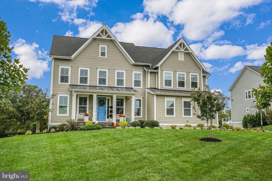 Join us for an Open House this weekend, Saturday 9/28 11:00AM to 1:00PM, and step into a world of unmatched luxury and comfort with this extraordinary NV Homes Stratford Hall model on a fenced in half acre lot backing to a nature preserve, nestled in beautiful Loudoun County, Virginia. This is not just a home; it is a sanctuary where elegance and sophistication define every moment. With over 6,300 square feet across three finished levels, this estate features a main-level in-law/au-pair suite and a convenient three-car garage with both double side entry and a single front entry.
As you enter, you will find a light-filled foyer that leads to an inviting flex room with glass French door that can be used as a study. Open formal dining room is separated by a butler’s pantry with wine fridge, perfect for entertaining. The gourmet kitchen boasts Quartz countertops, stainless steel appliances including  double wall ovens including a French door oven, white cabinetry, pot filler and a large center island—ideal for culinary creations in a chef’s paradise and for entertaining. The kitchen opens into the family room with soaring coffered ceilings and abundant natural light.  This space provides a warm atmosphere for family gatherings or cozy evenings by the gas powered fireplace. The entry to the two garage is separated by a spacious entry area complete welcome center and a large pantry. 
Step outside to the covered rear porch with maintenance free materials with stairs leading to a beautiful backyard surrounded by nature and enjoy the lower-level stone patio with pergola and with an outdoor kitchen, complete with the perfect setup for the Grillmaster - gas grill with burner, smoker, Green Egg and pizza oven making outdoor entertaining effortless.
Retreat to the second level outfitted with new carpet.  This level starts with the luxurious primary suite, complete with a sitting area, two walk-in closets and one fit for a Queen boasting natural light and tremendous space, and an ensuite bathroom featuring a separate vanities, soaking tub and large walk in shower. The other three spacious bedrooms on this level all have ensuite bathrooms and spacious closets.  This level is complete with a generously sized laundry room with front loading washer & dryer.
The fully finished lower level is an entertainment dream, showcasing a large great room with wet bar, dining area and family room.  This level also contains a home theater room, bedroom, full bathroom and generously sized storage area. 
Located in the sought-after Willowsford neighborhood—voted the nation’s Community of the Year—this home offers a vibrant lifestyle with top-rated schools, shopping, dining, and an array of resort-style amenities, including pools, a clubhouse, a fitness center, and scenic walking trails. Enjoy convenient access to Dulles Airport, local wineries, and commuter routes, with the Metro Rail Extension nearby to enhance your daily commute.
Do not miss your chance to embrace this NV Homes masterpiece on a large lot. Schedule your tour today and make your dream home a reality. Your journey into luxury living starts here at 23241 White Sycamore Place Aldie, VA 20105!