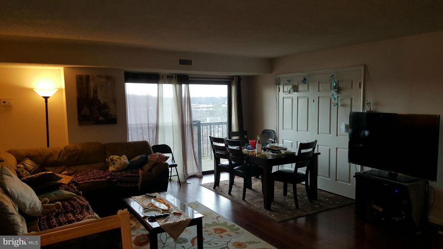 Seasonal views of Lake Barcroft from this 12th floor unit at popular Lakeside Plaza Luxury condos. Huge living/dining room combo with sliding door to balcony. The den/home office is adjacent to the LR. Garage parking and plenty of guests parking. Swim year around with indoor/outdoor pools. Media Room. Metro bus one block away.