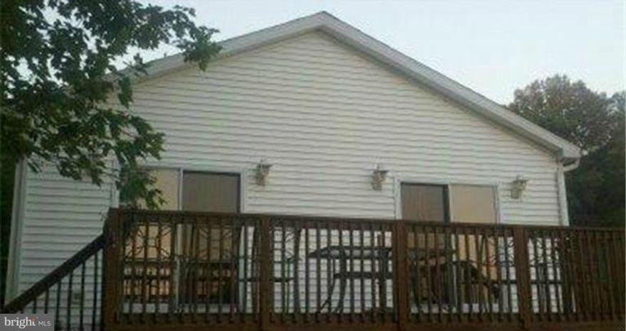 This affordable 3 Bedroom, 2 Bath waterfront rental backing to woods has its own boat ramp, lift and pier in a secluded cove just off the Chesapeake Bay. Easy access to fuel docks, the bay, Hart Miller Island and several local waterfront dining establishments. 10 mins to I-95 and White Marsh Mall complex.