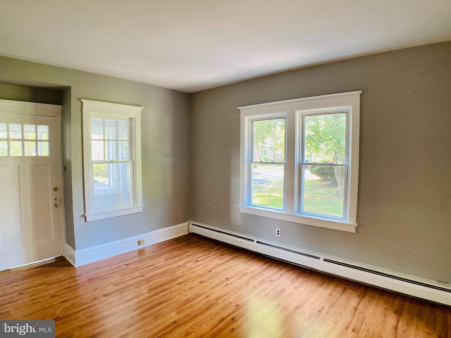 This charming, updated 2-bedroom, 1-bathroom apartment on a tree lined street in Ridley Park is now available for rent, offering a perfect blend of comfort and style. Upon entering this 1st floor unit, you are greeted by a large enclosed front porch, followed by the living room, dining room and kitchen.  The spacious living area is perfect for entertaining guests or simply unwinding after a long day.  Both bedrooms sit on the right side of the apartment and come with large walk in closets.  The property gets plenty of natural sunlight. This home also offers a private basement area with laundry hookups and additional storage space, providing ample room for all your needs. With off-street parking available, you'll never have to worry about finding a spot for your vehicle. Located in a desirable neighborhood, this apartment is close to amenities, shops, and restaurants, ensuring a convenient lifestyle. Close to ABC field. Optional garage space also available for rent with the unit. Don't miss out on the opportunity to make this fantastic property your new home. Book your tour today!