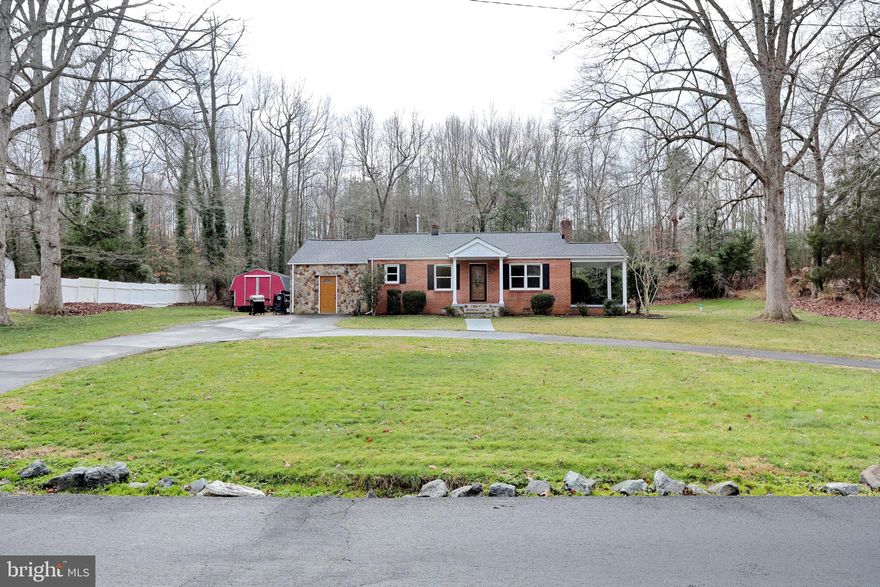 Charming 2-bedroom, 1-bathroom rambler featuring  a conditioned bonus room and spanning over 1300 square feet. The kitchen showcases new floors and granite countertops. Despite the two bedrooms, they offer ample space. Unwind on the inviting side covered porch or take advantage of the generous parking space provided by the u-shaped driveway. The versatile bonus room can serve as an additional bedroom, a stylish man cave, a home office, or even a dedicated workout room. This residence seamlessly blends comfort and functionality while also being in a great location for commuting and accessing shopping/food areas. Recent updates include new roof, siding and gutters in 2023 and new furnace and oil tank in 2022.