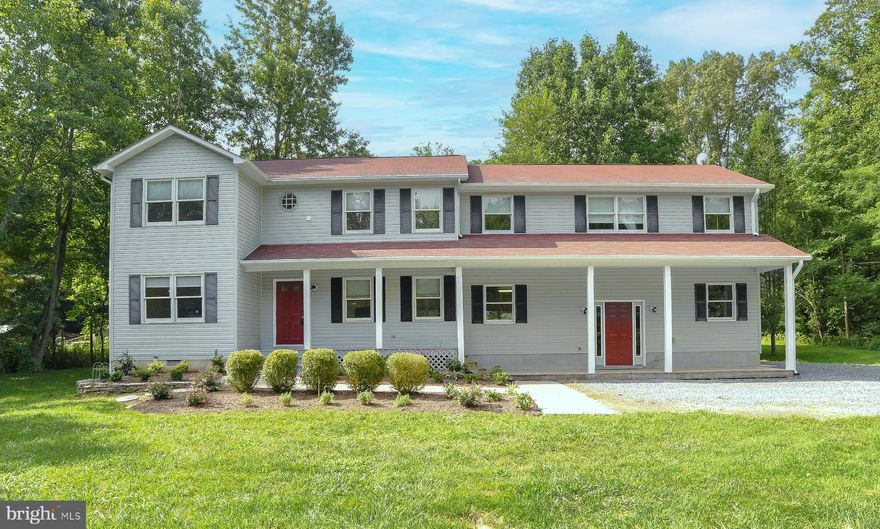 Bring your horses, chickens and goats to this amazing 4 1/2 property!   Enjoy the sounds of nature and all of its beauty while relaxing on the front porch.     The property is surrounded by trees with tons privacy.  Gardens, fenced areas and open space are ready for a new owner to jump right and make their dream home a reality.  The main house includes 3 bedrooms and 2 1/2 bathrooms.  The kitchen has been remodeled to include new cabinets, granite counters and stainless appliances.  The main level of the home has brand new luxury vinyl flooring throughout.   The home has been updated with new bathroom vanities, flooring, fixtures, freshly painted,  and new blinds have been installed.  There is also an office/den just off the foyer for anyone that needs to work from home.  The upper level has brand new carpet.  The primary bedroom has a walk in closet and primary bathroom.  The primary bathroom includes a soaking tub , glass shower w/tile, and dual vanities.  There are 2 additional bedrooms, a full bathroom and laundry area on this level.  The apartment over the garage includes separate access, a kitchen, living room, full bathroom,  bedroom and separate laundry.  This makes for a great guest area, in law suite, or rental property.  The stairs leading to the apartment have a chairlift for ease and accessibility.  The apartment has it's own HVAC and Electric separate from the main house.  The side load garage has space for a workshop and is 2 cars deep with plenty of driveway parking.  The property includes outbuildings for storage of farm and lawn equipment.  Close to schools, shopping, and area amenities.  Easy access to Route 235 for commuters to both the PAX Naval Air Station or north to Washington, D.C. or Northern VA.  Schedule your online appointment today.  24 hour required notice for all showings so please plan in advance.