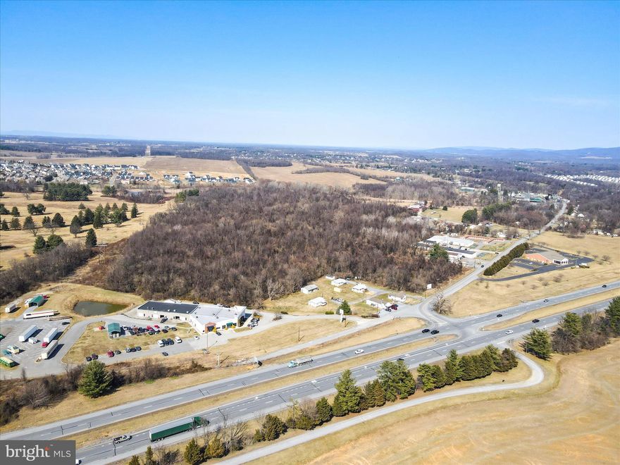 Amazing Development opportunity immediately off of Route 340 in Harpers Ferry not far from existing Public Water at top corner of property and very close to Public Sewer taps!  This one is a DO NOT MISS for any residential, commercial, or light industrial developer.  There is potential for a contiguous property that is listed by a separate company consisting of 13+/- acres to be a part of the sale off Halltown Rd.   Backing up to the par 3 Golf Course, that has been rumored in development circles, and fronting the Halltown Acreage, this property may have a lot more access than it looks like.  Current access from Halltown is off of Tabb Lane.  This is an incredible location and perfect for today's developer demands.