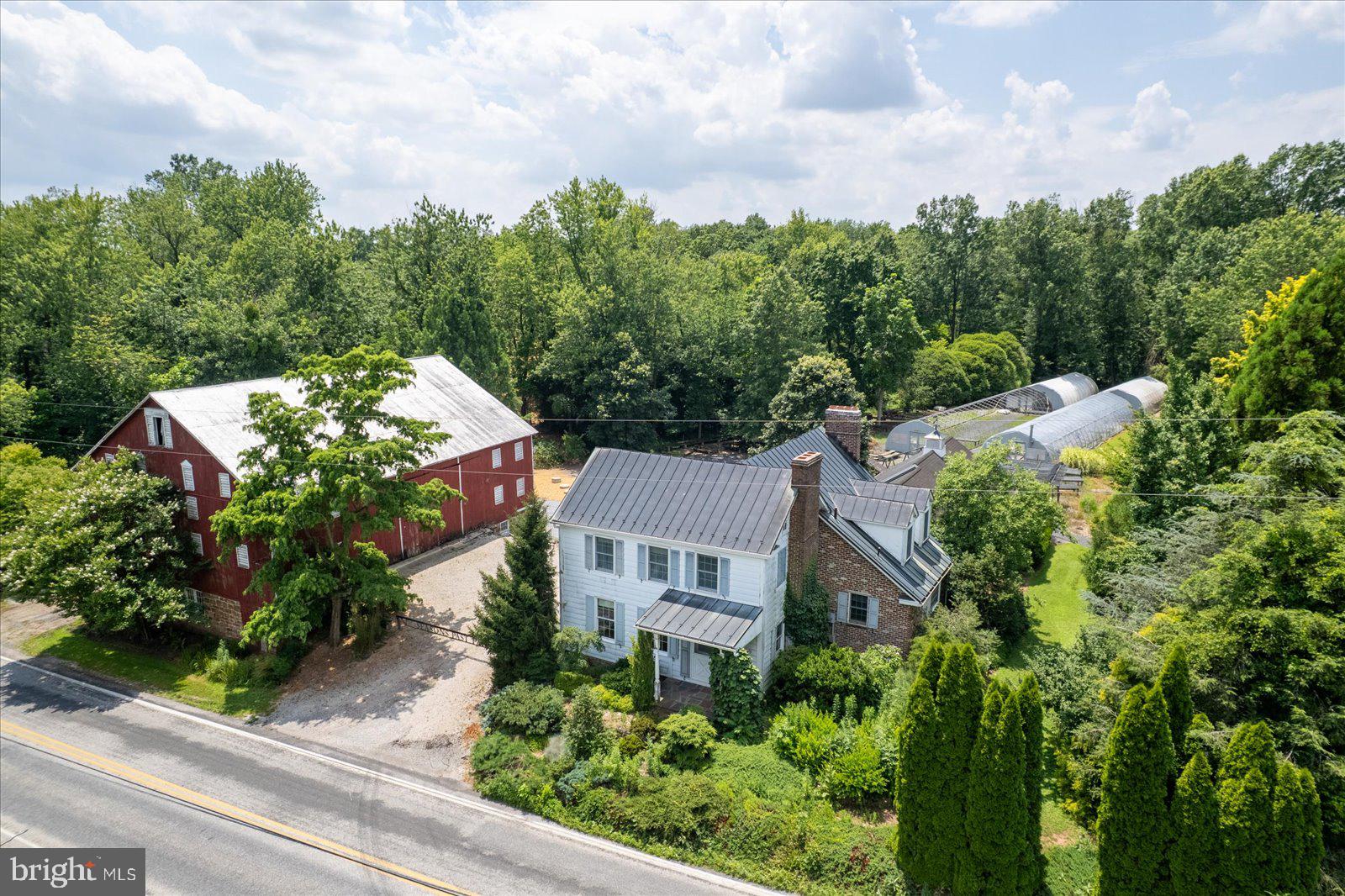 This gorgeous property is active again because previous buyer was unable to meet the home sale contingency. Their loss is YOUR opportunity!
Historic Charm Meets Endless Opportunity on 18+ Acres
Welcome to 825 White Hall Road, a rare gem nestled in a serene countryside setting. This charming 1800s farmhouse sits on 18.41 picturesque acres, offering a unique blend of history, functionality, and natural beauty. With 3 bedrooms, 2 1/2 bathrooms, 2 fireplaces and over 3,100 square feet of living space, this single-family detached home provides the perfect canvas for your dream rural lifestyle.
Step outside and discover the true magic of this property - a classic early 1900s bank barn, four hoop houses, and three ponds create an ideal environment for agriculture, fishing, hunting, bird watching or simply enjoying the peaceful outdoors. Brand new septic system installed in June, 2025. Formerly the home of Seasons Past Farm Nursery, the property is classified Clean & Green and lies within mixed-use zoning, opening the door for a variety of residential, agricultural, or commercial ventures.
Whether you're seeking a private retreat, a working homestead, or a business opportunity rooted in nature, 825 White Hall Road offers unmatched potential in a truly breathtaking setting.