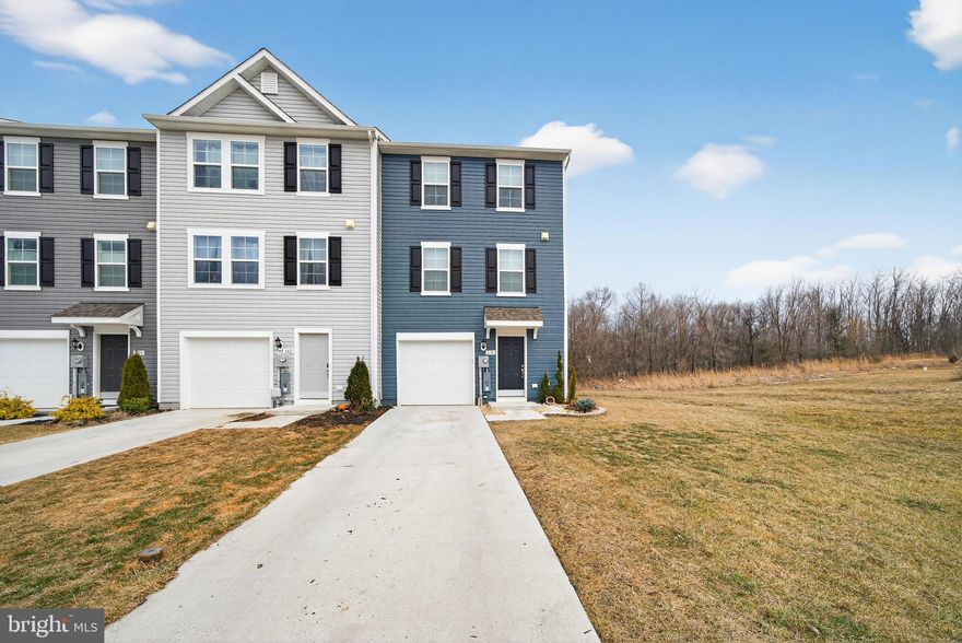 Discover the charm of this beautifully designed townhouse in the desirable Archers Rock community. Built in 2024, this Colonial style home offers modern living across three above ground levels with 3 spacious bedrooms and 2.5 bathrooms.

The main living level features an open concept layout with a bright living area, a well appointed kitchen, and a dining space ideal for entertaining. Upstairs you will find generously sized bedrooms including a primary suite with a private bath and ample closet space, along with convenient upper level laundry.

The entry level includes interior access from the one car garage and an unfinished area that offers flexible space perfect for storage, a home gym, or additional personal use. A separate enclosed utility room on this level houses the home’s mechanical systems and will remain secured for landlord access only for maintenance purposes. The one car garage is fully accessible and included in the lease.

Enjoy low maintenance living in a nearly new home conveniently located near shopping, dining, and major commuter routes.