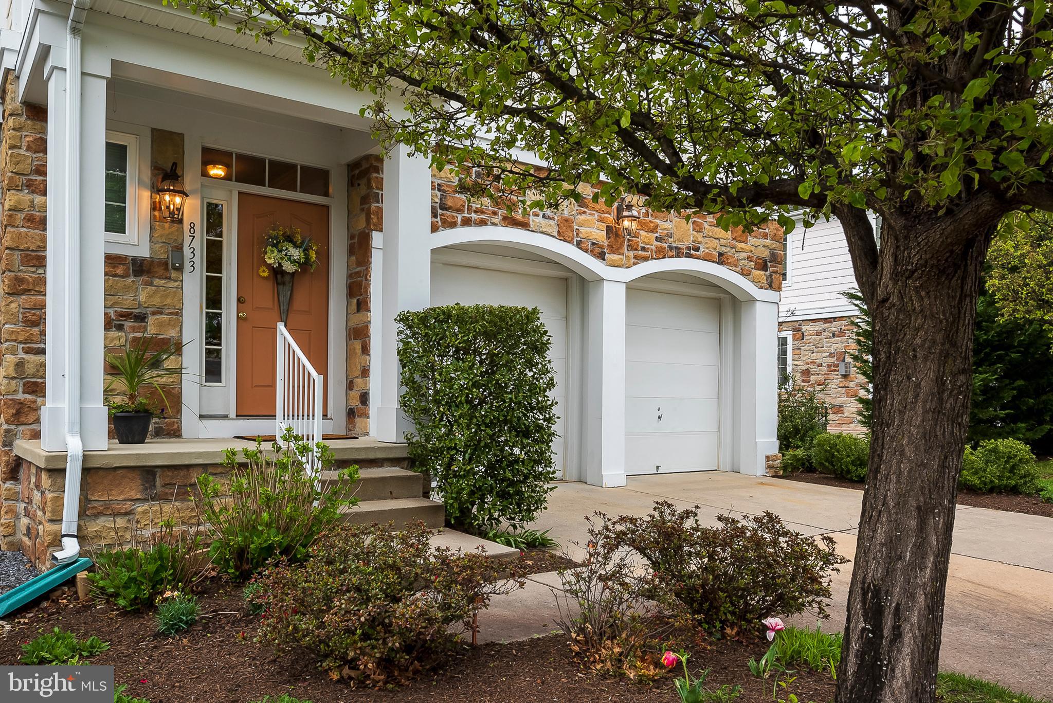 This gorgeous villa dream home, located in sought-after Snowden Overlook, is just what you've been looking for! No detail was spared in the construction of this beauty. With over 5,000 square feet of elegantly finished living space, it boasts soaring ceilings, walls of windows, beautiful appointments, both main and upper level master suites and so much more. The open main level, with its gleaming hardwood floors and tasteful crown moldings, is ideal for entertaining. The chef-inspired kitchen offers shining granite countertops, large center island, with cooktop and breakfast bar, stainless steel appliances and beautiful crown topped cabinetry. Your guests will flow freely from the kitchen into the formal dining area and spacious family room. You'll enjoy relaxing in the sunny family room with its 19' ceiling, gorgeous stone fireplace and lavish use of windows that make this room virtually dissolve into the outdoors. Step outside to the spacious tiered patio where you'll enjoy grilling with friends or enjoying a cup of coffee or glass of wine. Unwind in the main level master suite which features crown moldings, walk-in closet, access to the rear patio and attached master bath with separate soaking tub and shower. Ascending to the upper level you'll find an expansive loft overlooking the family room - the perfect place for an office, sitting room or library. The upper level master suite features crown moldings, walk-in closet, sitting area and attached master bath with separate soaking tub and shower. With an additional generously sized bedroom with en-suite bath, there's plenty of room for guests. The lower level is the ultimate entertaining space complete with a fully equipped granite bar and spectacular wine cellar with 300 bottle capacity! No need to go out for a wine tasting - enjoy one right in your own home! This friendly, gated community is known for its stunning clubhouse, fun events and activities, game room, fitness center, pool and carefree grounds maintenance. This impeccable home is convenient to major commuting routes, shopping and restaurants. Call Laura or Lisa today to view this home and make it yours!