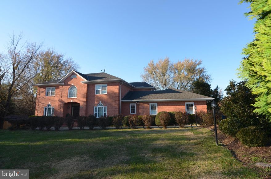 Gorgeous Home in Prestigious Neighborhood**Renovated Bathrooms.  New Hardwood floor in upper bedrooms level makes it 2 levels hardwood floors**  refinished wood stairs. Great for Entertaining** main level has large family room with cozy fireplace and large living room plus huge sunroom leading to large deck with stairs to beautiful large private backyard backing to trees on .92 Acre. Upper level has large size bedrooms **Master suite With  sitting area & Huge Master bathroom  has separate shower & soaking tub Separate his and her  Vanities**LOWER LEVEL ideal for au pair or extended family suite, it has large size recreation room renovated full bathroom and nice large size bedroom with extra storage room  **Great location off Beulah Rd. with Great schools**Easy exit to 66 & Dulles Airport.