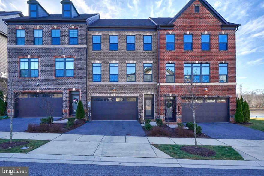 Greenleigh at Crossroads is the only new Baltimore County urban village of Luxury Townhomes near commuter routes offering great amenities perfect for an active lifestyle! The Andrew Carnegie design features a 2-car front entry garage. 3,120 square feet of living space on 3 levels boasting modern features and finishes throughout. The Main Level features a bright and open gourmet kitchen, a large dining room, and a living room on either side of the kitchen also a half bath. Balcony access from the Main Level Living Room. The Upper Level features 3 Bedrooms and 2 Full Baths. The Master Bedroom has its own Ensuite Bathroom and 2 Walk-in Closet. The Lower Level features an In-Law Suite with it's own laundry area! One of the very few in this community. The neighborhood features walk-to shops, a pool, a resort-style clubhouse, a fitness center, trails, a playground, and more!