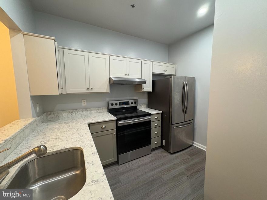 Pristine Ground-Floor Unit – Move-In Ready! Rare opportunity to rent a meticulously kept 1st-floor unit at 606 Moonglow Rd. Unit 103 features a functional floor plan designed for efficiency and style. Highlights include an updated kitchen with ample cabinetry, new flooring, and a generous primary bedroom with an updated bath. Perfect for a busy professional looking for quick access to route 32, this unit is just 10 mins from the Odenton Train Station, 20 mins to Annapolis and 30 mins to DC or Baltimore.  Close to shopping and restaurants, this unit is perfectly situated in the golden triangle.  Schedule your tour today—this one won't last! Apply at https://apply.link/HiIqlEk