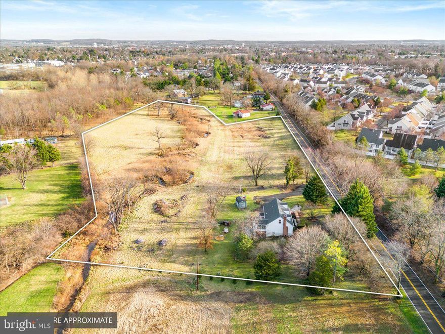 **Open House Saturday 3/15 from 12 - 2PM** Check out this rare opportunity to own an 8 + acre tract of land with a gorgeously updated home in close proximity to all Downtown Frederick has to offer. This completely updated home has gleaming hardwood floors throughout and four full bathrooms with beautiful tile and new vanities.  Enjoy the potential for main level living with the spacious primary suite.  The kitchen offers spectacular views with new cabinets, appliances and countertops as well as access to the covered porch.  The upper level provides two more very large bedrooms that are finished with hardwood floors and access to the third full bath.  As you head to the basement you will be pleasantly surprised by the 9' ceilings, additional cabinet and counter space, large living areas, a 4th full bath, and walkout level access to the backyard.   

Possibly the best feature is the property that surrounds the home.  You will not have another opportunity to enjoy privacy and seclusion of the 8 acres with the shortest drive to Historic Downtown Frederick.  Easy access to shopping, dining, and major commuter routes.  Buyer is to verify potential agricultural uses and the potential to Ag tax benefits