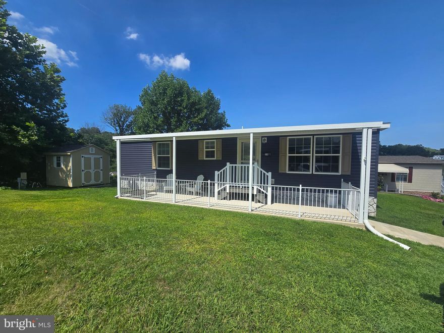 Welcome to this stunning 2021 manufactured home located in a highly desirable 55+ community! This move-in ready home features an open floor plan with modern upgrades throughout, including stylish flooring, stainless steel appliances, and energy-efficient systems. The spacious primary suite offers a walk-in closet and private bath, while the covered front porch is perfect for relaxing or entertaining.
Enjoy low-maintenance living with access to fantastic community amenities including a clubhouse and a dog park. Conveniently located near shopping, dining, medical facilities, and more. Ideal for downsizers seeking comfort, convenience, and a vibrant community lifestyle.
Don’t miss this opportunity—schedule your showing today!