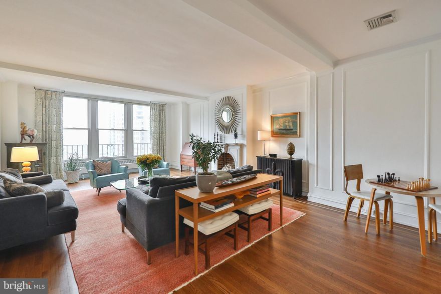 Treetop views of Rittenhouse Square welcomes you in this bright and beautiful 3 bedroom, 3 bath home in the Rittenhouse Plaza.  A gracious foyer leads to a quaint sitting area before entering the spacious living room overlooking the Park! This elegant space features beautiful hardwood flooring with mahogany inlay and a decorative fireplace great for entertaining or a very cozy place to read and unwind.  The formal dining room with ornate molding is perfect for both intimate and large gatherings. The oversized open kitchen is complete with breakfast bar, granite and soapstone countertops, custom cabinetry with 2 pantries, 5-burner gas cooktop, stainless steel appliances, and tile backsplash.  Additionally, there is a butler pantry with an abundance of counter and cabinet space, perfect for prepping when hosting dinner parties.  A bonus room with a full-sized washer/dryer and storage galore is a huge plus for one-floor living. This home offers 3 generously sized bedrooms!  The east wing of the home includes 2 bedrooms that feature custom built-ins, large closets and en-suite baths. The corner bedroom features 3 windows with stunning views of the square! The west wing offers another corner bedroom overlooking the park and has floor to ceiling built-ins and has access to the Hallway bathroom. This newly renovated bathroom is complete with white Carrera marble flooring, marble shower with frameless glass shower doors, and a new vanity.  Additional amenities include many closets throughout, and a personal storage locker located in the building's lower level.  The Rittenhouse Plaza is a New York style, pre-war building entered from a beautifully landscaped courtyard. It is pet friendly and offers a 24-hour concierge as well as door attendants for both the courtyard and 19th street entries, an on-site management office and maintenance. The monthly co-op fee includes real estate taxes, Fios cable, internet, heat, water, sewer, and building maintenance. A one-time co-op transfer fee of 1% of the purchase price is paid at closing.  $1250 non refundable application fee is required. Step out of your front door into Rittenhouse Square where you're surrounded by upscale restaurants, casual eateries, shopping, museums and much more.