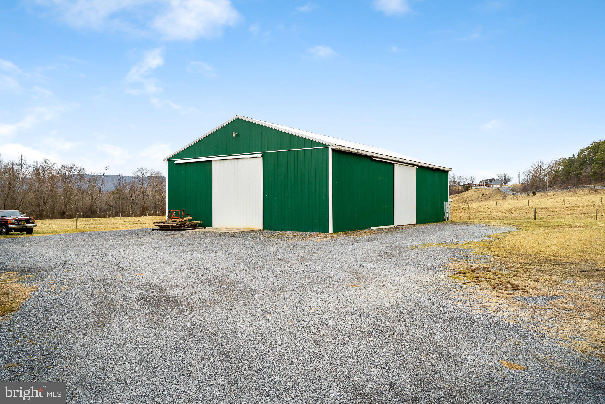 If you are looking for land with beautiful views, creek frontage and minimal restrictions, then look no further!
Three separate parcels being sold together totaling 60.98 acres with a 40x 60 pole building equipped with a bathroom, office and loft area for storage. Part of the property is in the flood zone but there is a buildable site not located within the floodplain.
Gated private access to Back creek for fishing, tubing, and the convenience of having your own recreational area for friends and family. Residential listing also available, see listing WVBE2006960