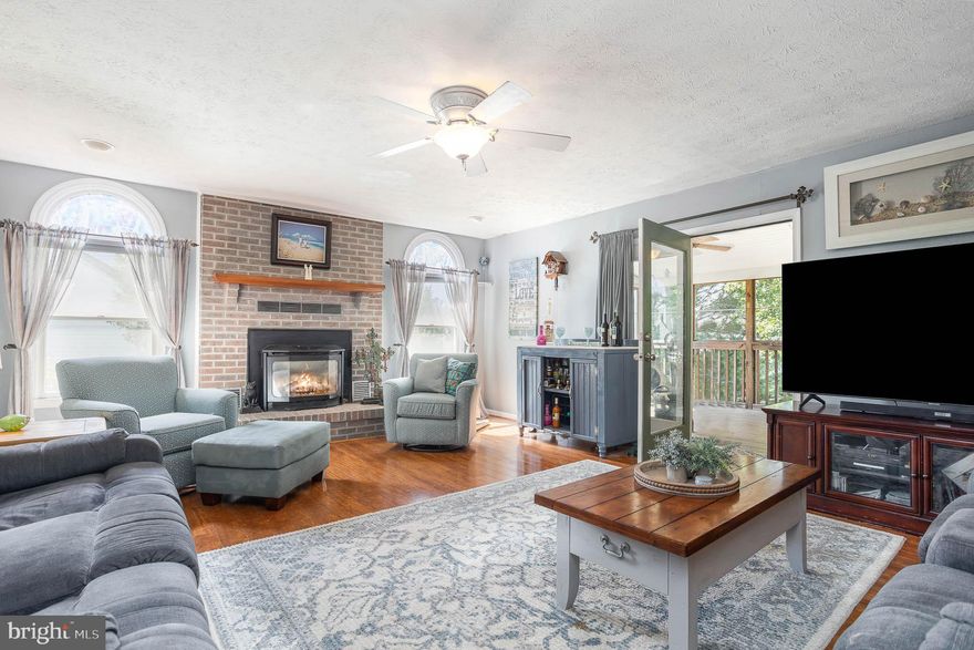 Wonderful location in a well-established community, this home will be the one you want to call HOME! With over 3000sf, showcasing 4 oversized bedrooms & 2.2 baths, offering plenty of space for years of enjoyment.  The Primary Bedroom en suite is a welcome retreat w/ vaulted ceiling, sitting area, walk in closet & newly updated bath w/ designer tile, double vanity & an oversized custom shower.  Additional 3 bedrooms on 2nd floor that provide plenty of space for your needs, add'l updated full bath & convenient upper-level laundry area.  The main floor has gleaming wood floors that welcome you to the formal dining room & brightly sunlit living room.  Renovated kitchen w/ granite island, recessed lighting, modern SS appliances & plenty of cabinet storage space.  Open layout to a fantastic family room w/ brick front gas fireplace for those cozy days at home.  French doors open to the screened in multi-season porch w/ an add'l spacious deck that provides endless opportunities for entertaining & BBQs, plus gorgeous sunset views! Fenced in backyard w/ landscaped gardens & mature trees compliment the private yard.  Finished lower level has even more space to expand, including a workshop space w/ storage & bonus half bath w/ rear access to yard.  Under deck shed included for extra storage.  Walking trails, convenient shopping & nearby transportation will also entice the next Buyer of this home, make your visit today!   **Seller offering a $2500 carpet allowance w/ acceptable offer**Seller prefers rent back option