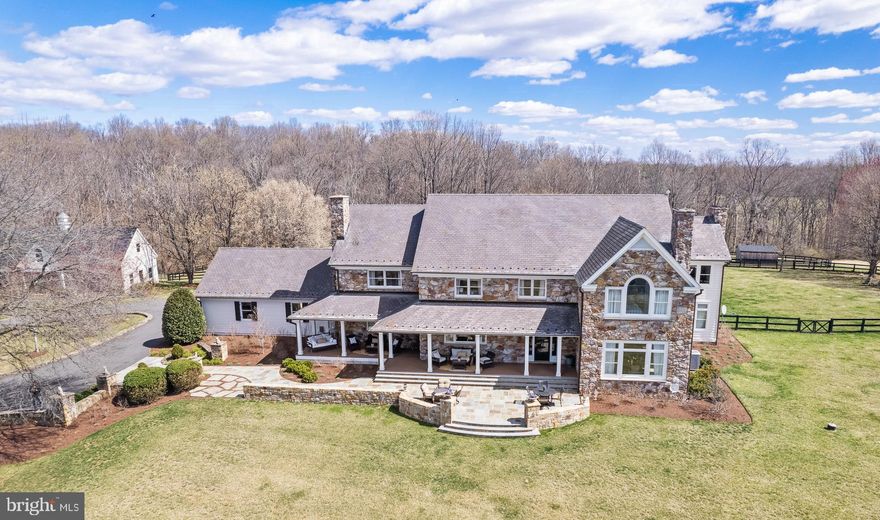 Welcome to Foxwood Hill, a breathtaking private estate just minutes from the charming village of Philomont. Designed and built by a well-respected local builder as his personal residence, this exceptional property offers over 7000 square feet of living space, a picturesque pool, a spacious workshop, and 31 acres of rolling pasture—ideal for horse enthusiasts or those seeking a tranquil country retreat.

This 5-bedroom, 4.2-bath home includes exquisite architectural details, including a gorgeous grand entryway showcasing a beautiful double staircase with two-story foyer, formal living and dining rooms, a warm and inviting family room with wood-burning fireplace, and a pantry/mudroom to die for. The thoughtfully designed layout creates an effortless flow, perfect for entertaining and everyday living.
The enormous basement provides 3 spacious finished areas, a rec room, fitness room, and yoga room, plus ample unfinished storage and half bath. A separate hidden lower level storage space is perfect for valuables/gun storage. The large workshop, originally designed for boat construction, offers endless possibilities—it could easily be converted into a barn or a guest cottage and already has rough-ins for a second-floor apartment.
For the equestrian enthusiast, the property is thoughtfully designed with three-board fencing, three well-maintained paddocks with water access, and a run-in shed for the comfort and care of horses.



The home has been extensively updated by the current owner and meticulously maintained. The kitchen was beautifully renovated with professionally refinished cabinets, new quartzite countertops, farmhouse sink, and updated stainless steel appliances. All floors and banisters have been refinished, and the entire interior and exterior have been freshly painted. New Trex front and back porches and a beautiful slate Sunset Terrace enhance the outdoor living spaces, offering breathtaking views. The entire 1/4 mile driveway has been paved and extensive new hardscaping and landscaping add to the property’s curb appeal. 



Ideally situated between Middleburg and Purcellville, this extraordinary estate offers the perfect blend of private country living with modern conveniences just minutes away. Experience exquisite entertaining at sunset, a peaceful setting, and the hunt country lifestyle you’ve been looking for at Foxwood Hill.