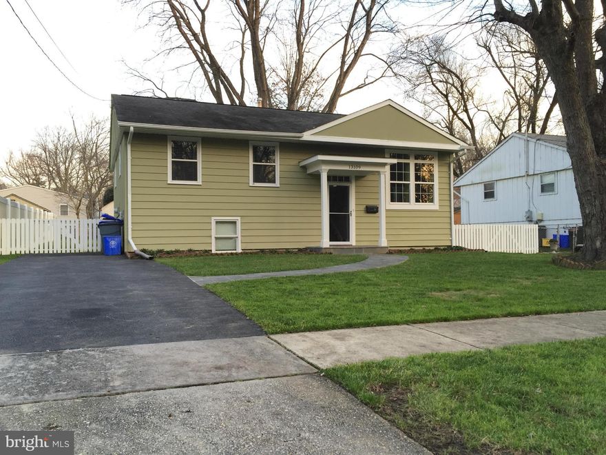 This home sparkles.Just renovated spacious home in a very pleasant and convenient community.Close to metro bus and shopping.Improvement include refinished hardwoods, ceramic,tile, fresh paint,42" oak cabs, silestone, counter-tops and stainless steel appliances, back splash, New Recessed Lighting,Eco-Friendly Cork Kitchen Floor, and Large fenced backyard with a deck and Patio!