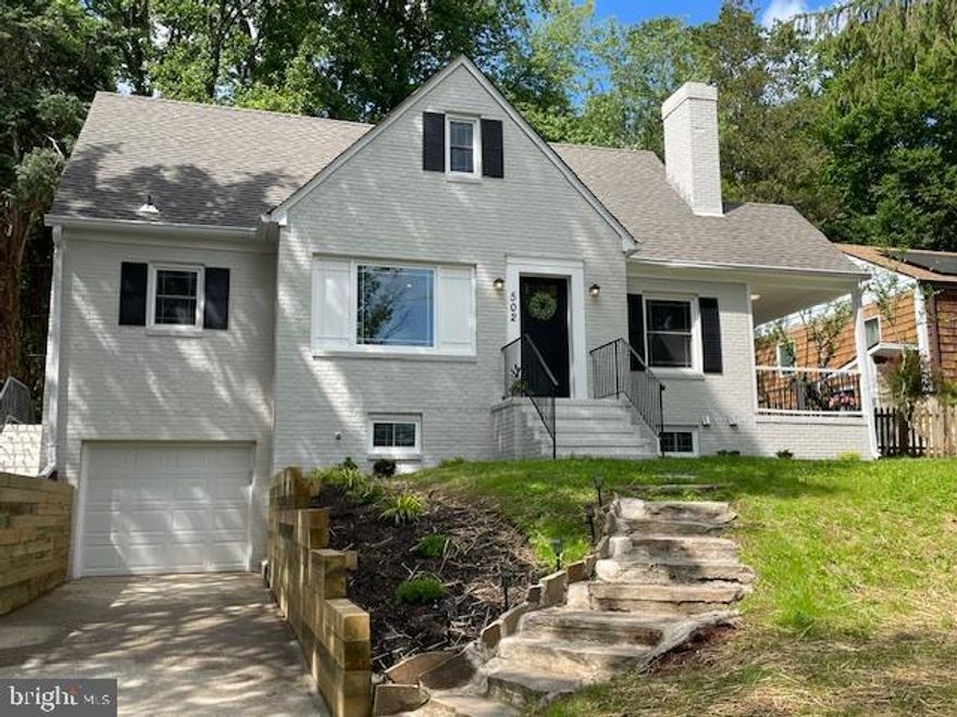 Towson TURNKEY living at its finest. *Incentives available, please ask! * The finished area of the main and upper levels total over 2,000 sf and the lower level has 870 sf of finished area.  Elevated features include a KITCHEN LEVEL PRIMARY SUITE, NEW GAS FURNACE AND A/C, UPDATED PLUMBING AND ELECTRIC, NEW HOT WATER HEATER, NEW APPLIANCES, NEW WINDOWS, NEW FINISHED SPACES, MOLDINGS AND FLOORING (REFINISHED HARDWOODS), KITCHEN CABINETS AND LIGHTING.  The gourmet quartz countered kitchen showcases a decorative back splash, counter depth refrigerator, stainless undermount sink, a pantry, and double under cabinet lighting. The dining room extends naturally from the kitchen with wrap around cabinetry and shelving space.  The wood burning fireplace beckons you to come and relax in the living room, also with excellent natural and overhead lighting. Spend cozy nights enjoying this entertainer's space with guests, who have access to the half bath area off the living room. Warm breezes await you on the lovely side porch with views to the park across the street.  The upper level offers 2 spacious bedrooms with hardwood flooring and nice sized closets. The cutest nook could be a home office, play area or just another relaxing space. The upper bath is also custom and adds some cool factor with the design of the bath/shower area. The lower level has yet another bedroom with access to another full bath with custom shower area. The family room is a perfect quiet living space; this area accesses the garage with NEW electric door. There is also a laundry area, furnace room and utility room with utility sink and rear outdoor access.  All the overhead lighting is LED.  There is a door from the kitchen as well, leading to the front or back yard. The home views the park across the street and is part of the Southland Hills Neighborhood Association, a voluntary association with neighborhood events.  *Property taxes reflect the previous condition of the home. *Note photo descriptions for additional renovation information.