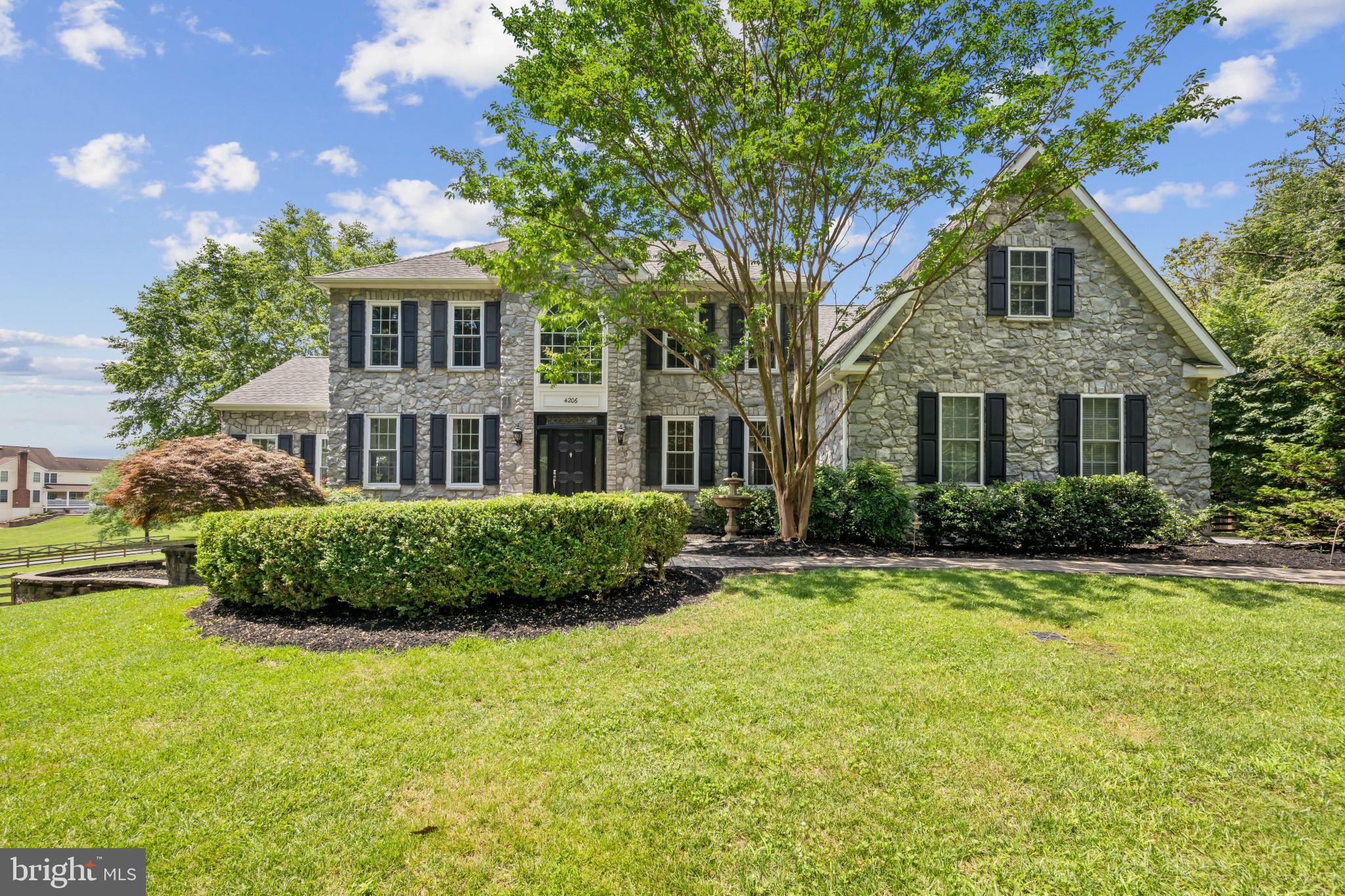 Welcome to a Carroll County retreat-like home with No HOA! This beautifully fenced-in, landscaped yard and well-maintained home has 4 bedrooms, 3 and half bathroom and sits on a peaceful 3-acre lot with amazing views. The main level boasts its ample space with its large sunroom, main level office, dining room, formal living room and family room with gas fireplace. The large open kitchen with counter space for barstools, walk-in pantry and area for a large kitchen table, leads to a beautiful deck and screened Gazabo. The deck takes you to a lower patio, perfect for grilling or bonfires. The main level laundry/powder room is conveniently located, entering the 3-car garage. The upper level provides a Primary bedroom (newly installed carpet June 2025) with sitting room space leading to a renovated primary bathroom (2016). Another bedroom (newly installed carpet June 2025) with an en-suite bathroom. There are 2 additional bedrooms with a Jack and Jill Bathroom providing a great space for guest. The full-sized unfinished basement with rough-in has endless possibilities and has a walkout to the patio. Some of the upgrades include The 2 zones systems, new windows (2025; except sunroom), Hot water heater (2 years old), waterproofed basement. Well Pump replaced (6 years old), Whole house scrubber and UV light on both HVAC systems. This is house well-loved and it shows! Schedule your tour today!