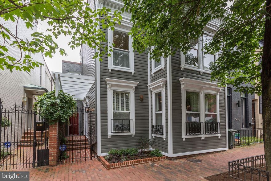 Handsomely renovated Federal w/double parlor LR with FP, formal DR with FP & Gourmet Galley Kitchen. The second floor Master Suite has a FP,  his/her walk-in closets, a study/sitting room extending the width of the house.  The top floor has 2 roomy BRs and 1 BA.  The 4th BR, 3rd BA and 2nd HB, 2nd laundry & Kitchen are in the carriage house above the 2-car Gar. There is large pool and lush garden.