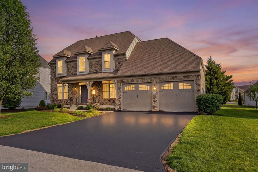 DO NOT MISS OUT!!! Available for showings April 7th. Open House Schedule, Meet the Dream Team: 
11-1pm  Saturday 04/11
1-3pm     Sunday 04/12

Saturday  Immaculately maintained stone-front contemporary located in the highly sought-after gated community of Beallair. This exceptional home showcases timeless finishes and thoughtful design throughout, including plantation shutters and refined architectural details.

The main-level primary suite offers both comfort and convenience, featuring a tray ceiling, spacious walk-in closet, and a well-appointed en-suite bath with double vanities, soaking tub, and separate shower.

Designed for both everyday living and entertaining, the open-concept layout includes a dramatic family room with vaulted ceilings, gas fireplace, crown molding, and hardwood flooring. A formal dining room adds elegance with chair rail detailing, crown molding, and continued hardwoods.

The expansive country kitchen is a true centerpiece—complete with stainless steel appliances, Corian countertops, recessed lighting, a center island, and a pantry for ample storage. A dedicated laundry room is conveniently located just off the two-car garage.

Upstairs, you’ll find two generously sized bedrooms, each with walk-in closets, along with a full bath—ideal for guests or additional household members.

The mostly finished lower level offers incredible versatility, featuring a large recreation room, fourth bedroom, half bath, and utility space. A wide walk-up stairwell provides easy access to the backyard.

Outdoor living is equally impressive with a screened-in porch, patio, and mature landscaping that creates a private and inviting setting.

This is a rare opportunity to own a beautifully maintained home in one of the area’s most desirable communities—schedule your private showing today.