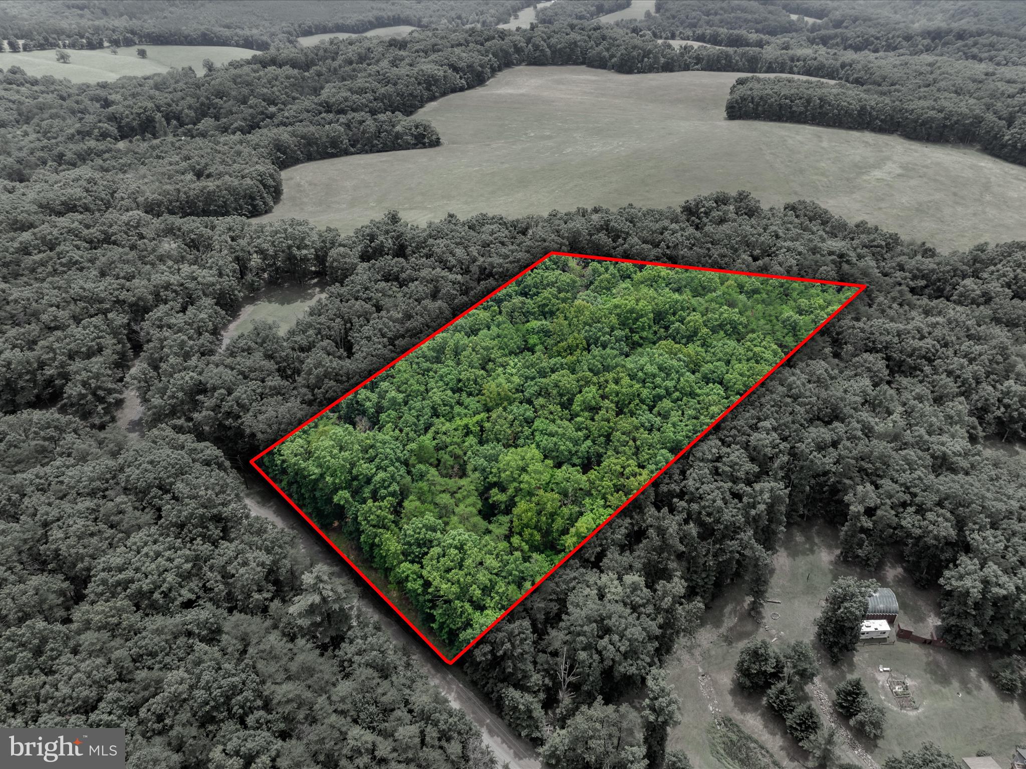WOODED LOT looking for a wooded lot to build your full-time or part-time residence, this maybe it. This 4.19-acre lot is all wooded and ready for you to decide where to build. It is in a small community with an HOA but restrictions are minimum. Community ponds and picnic area are available for fishing and hanging out with friends and family. Less than 5 miles from Cacapon Resort State Park for hiking, biking, swimming, boating, fishing, golfing and even horseback riding. Approximately 30 miles to Winchester Va and 15 miles to Historic town of Berkeley Springs/Bath.