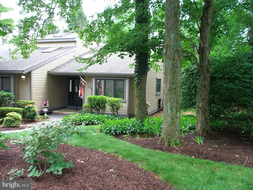 Desirable Hershey's Mill  End Carriage Home boasts a well-maintained condition, ensuring  you have a move-in ready experience! Step inside to discover a thoughtfully designed interior featuring your recently remodeled kitchen, newer owners en suite EZ clean tile bathroom, new skylights with remote blinds, fresh paint in a neutral color, plush carpeting and elegant flooring. The spacious living area is enhanced by a cozy fireplace, perfect for intimate gatherings or quiet evenings. The well-appointed Eat In Kitchen showcases stainless steel appliances, including a built-in microwave, induction cooktop, self-cleaning oven, and dishwasher, making meal preparation a delight. A breakfast area invites casual dining, while the adjacent dining space and covered outdoor deck are ideal for entertaining. This residence offers three generous sized bedrooms and three full bathrooms, including a luxurious owners en suite bathroom with double sinks, walk-in shower, a tub shower combination and new skylights with remote controlled blinds for ultimate relaxation. The main floor laundry adds convenience to your daily routine. For overnight visitors there's a 2nd floor loft bedroom and full bathroom plus a main floor 2nd bedroom and hall bathroom.  The detached garage provides secure parking and additional storage.  Outside, enjoy the beautifully maintained grounds with lawn care included, allowing you to spend more time enjoying tennis, pickleball, community pool, an 18 hole golf course, walking trails, fenced dog park or to socialize with neighbors in community offered recreational activities. With a comprehensive association fee covering common area maintenance, gated 24 hour security access, and snow removal to your entry door, this property ensures a low-maintenance lifestyle. Experience the perfect blend of comfort, elegance, and community in this remarkable home in a development where your pets are also welcome!