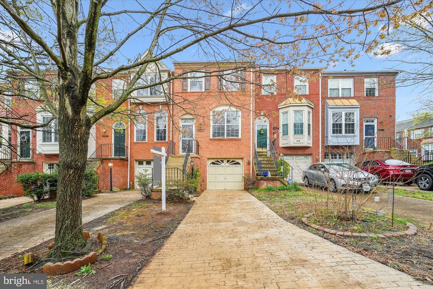 Welcome to this lovely McNair Farms townhome with bump outs on all three levels. This rarely available floor plan offers two primary bedrooms with vaulted ceilings, both with ensuite bathrooms. The bathrooms have been updated with new tile flooring, vanities and fixtures. All flooring just replaced! Brand new Luxury Vinyl Plank flooring throughout the main level and new carpet in the lower and upper levels. Kitchen boasts stainless steel appliances, a center island, and newly installed recessed lighting. A sliding glass door leads to the deck off of the breakfast room and overlooks the fully fenced rear yard. The 1-car garage leads into a spacious, walk-out lower level.  Enjoy all the McNair Farms amenities with super low HOA dues, offering a pool, tennis and basketball courts, tot lots, a community center, and trails. Easy access to the Clock Tower Shopping Center, Dulles Airport, the Silver Line Metro, Reston Town Center, Tysons Corner and major commuting routes.